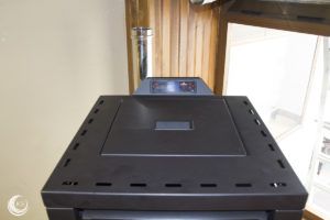 Hidroestufa de pellets Bronpi conectada a radiadores en Reinosa - Ingeosolar