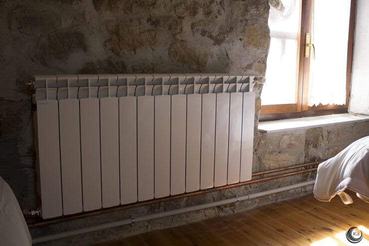Radiadores conectados a termochimenea de leña - Ingeosolar